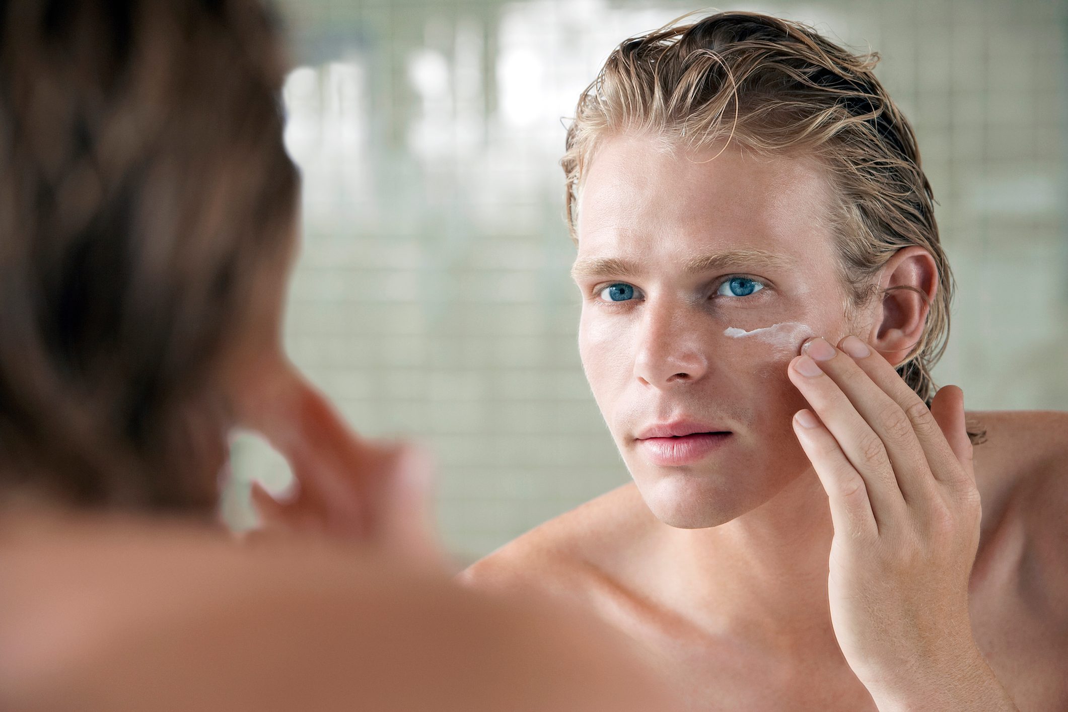 Man Applying Facial Cream