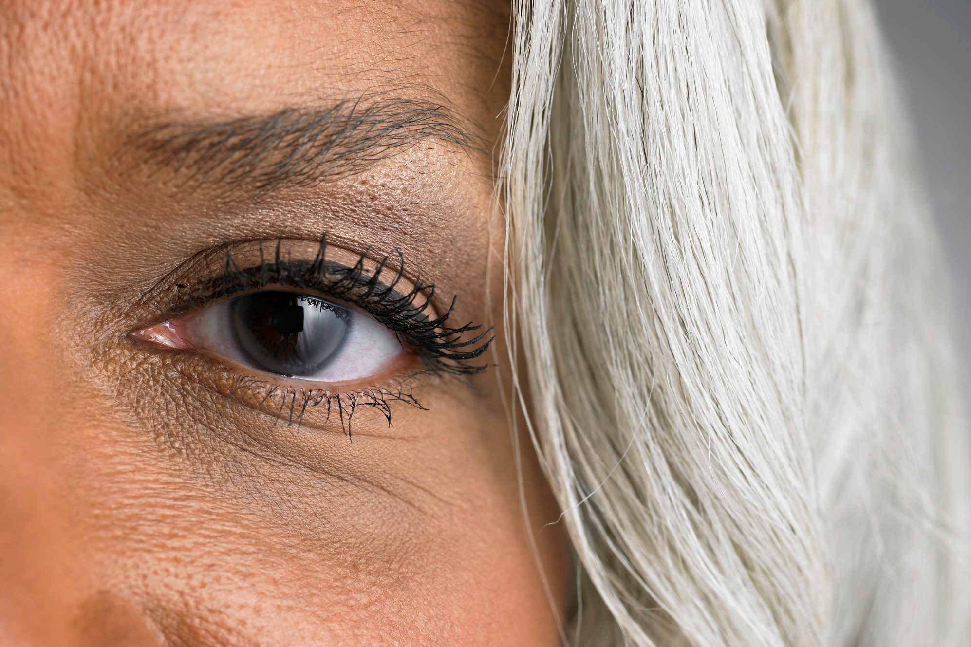 Mature woman, portrait, close-up of left eye