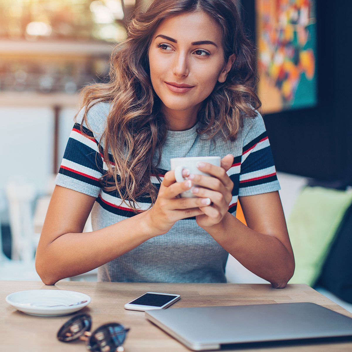 Beautiful woman having a cup of coffee