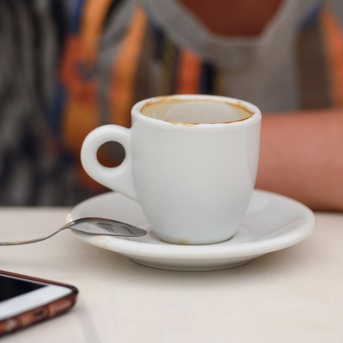 image of cup after drinking coffee on a table close-up