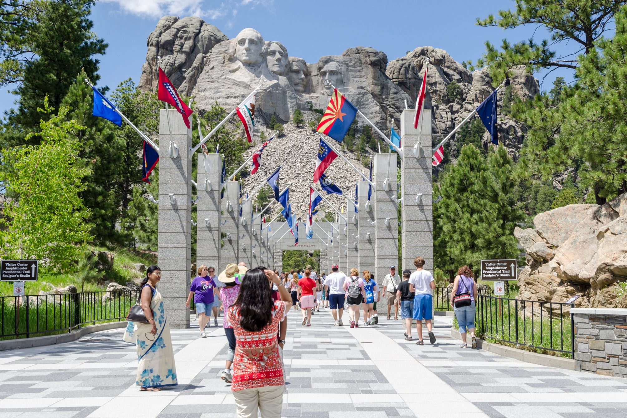 Visitors at Mount Rushmore Avenue of Flags.