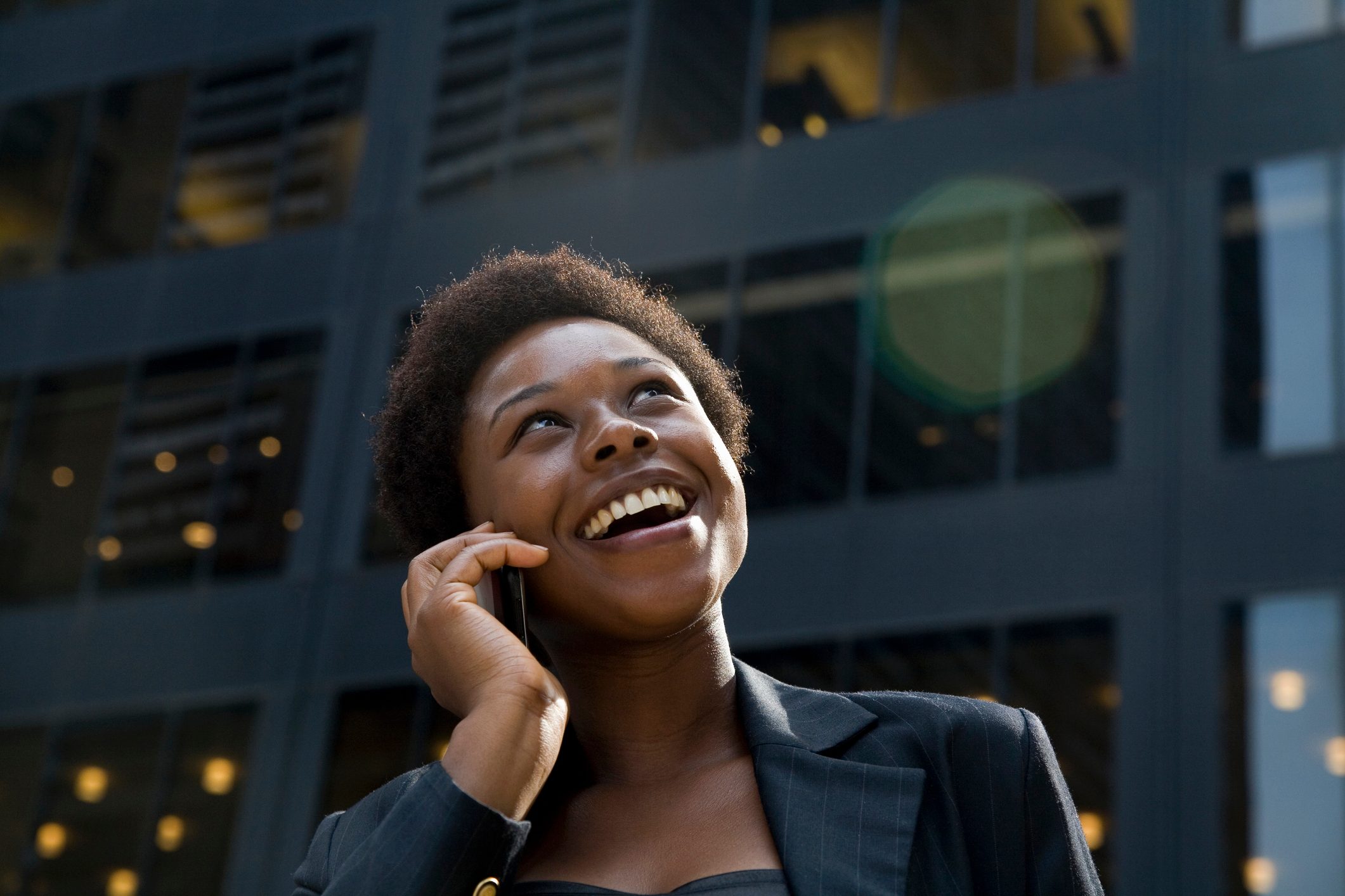 Businesswoman downtown on mobile phone