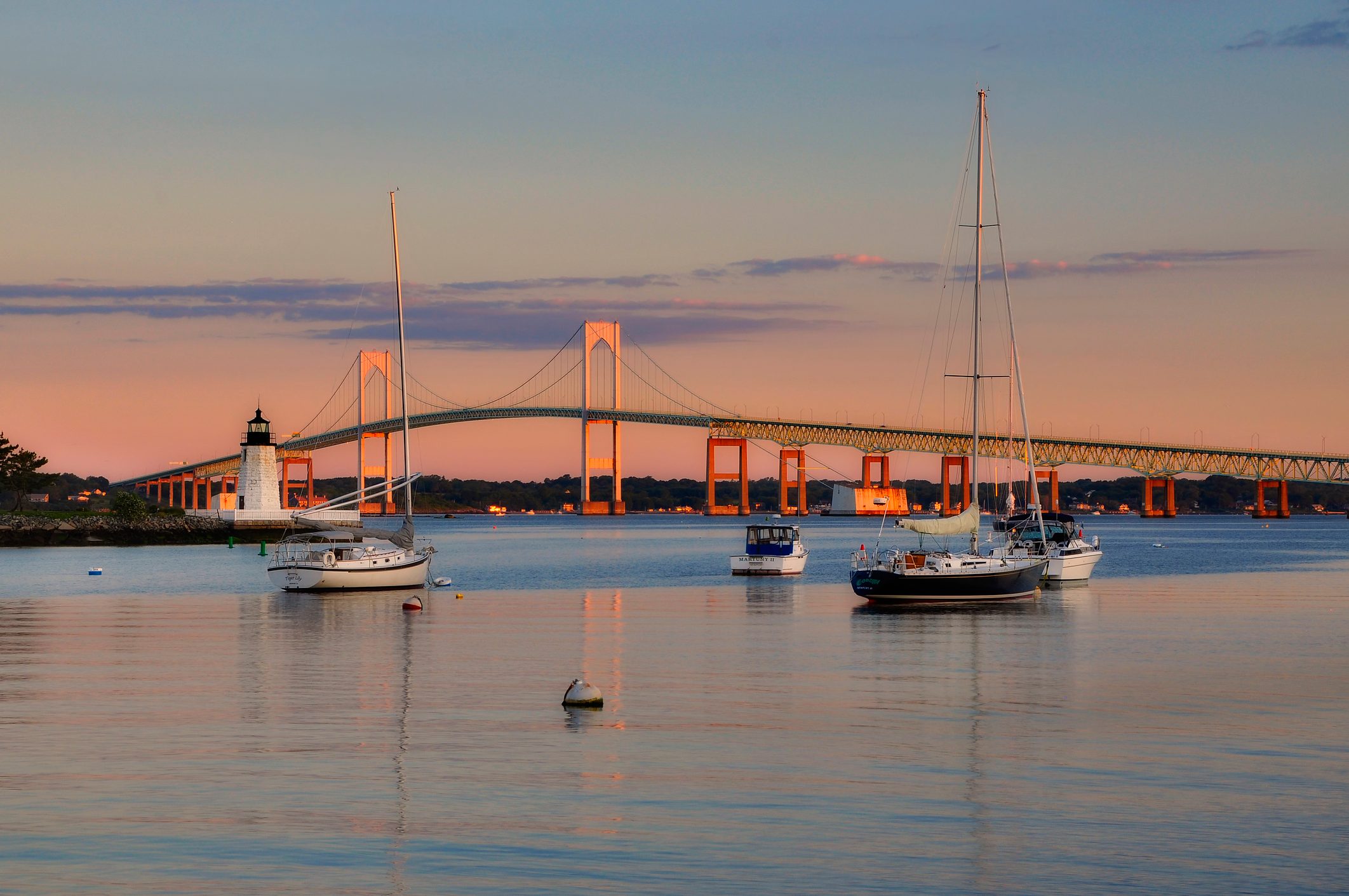 Goat Island lighthouse and the Jamestown at sunrise, Newport, Rhode Island