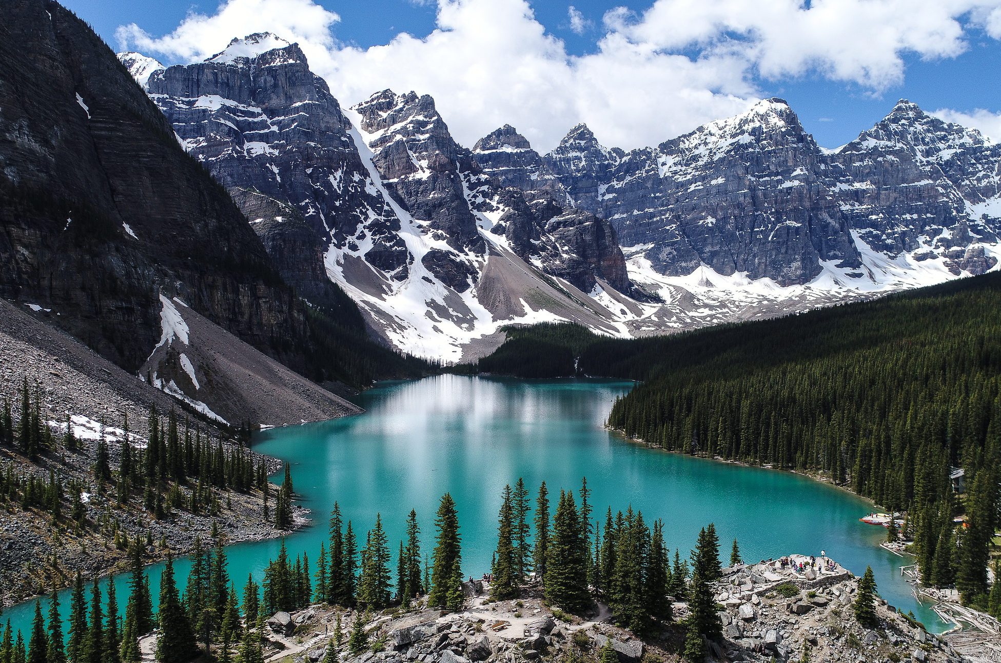 Scenic View Of Lake And Snowcapped Mountains Against Sky