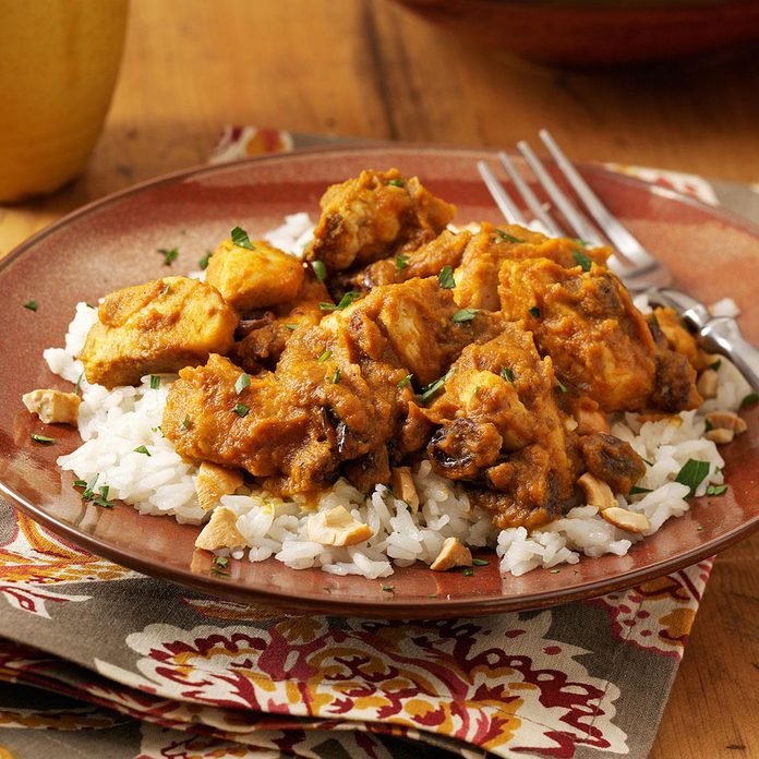 Pumpkin-curry chicken over cashew rice