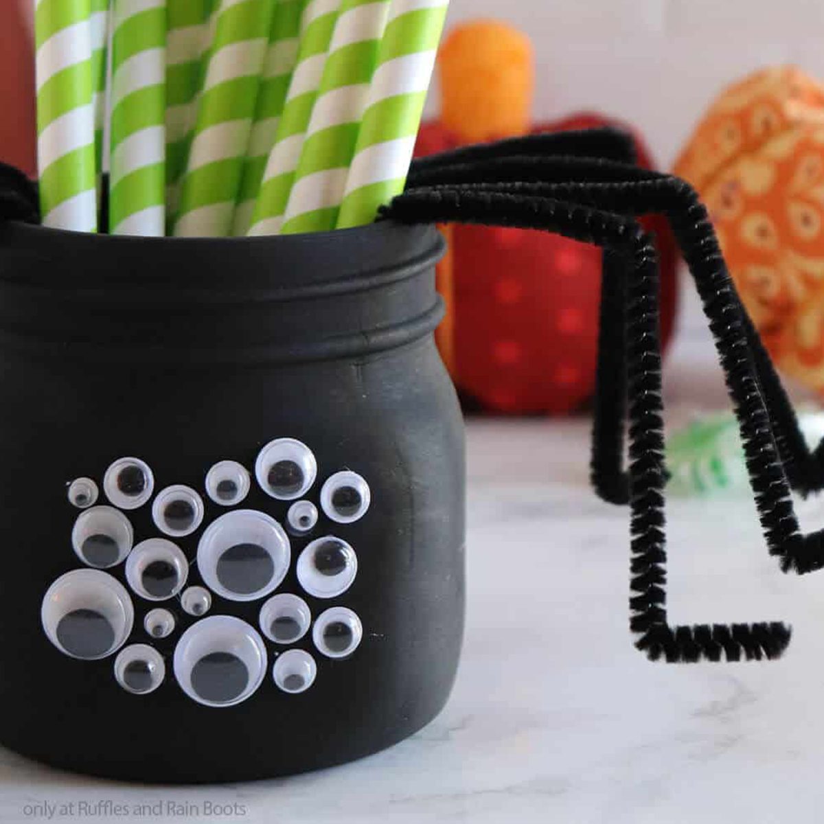 Spider Mason Jar Via Rufflesandrainboots