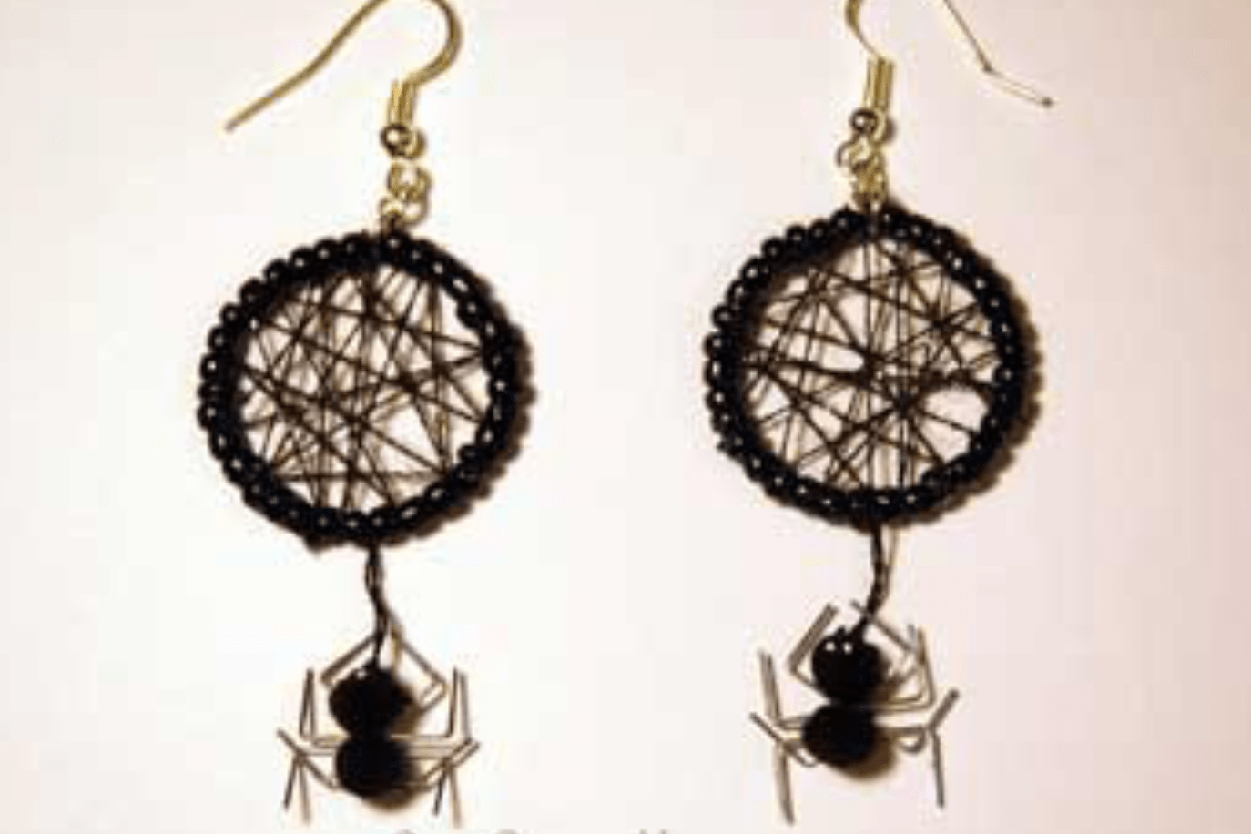 Spider web earrings