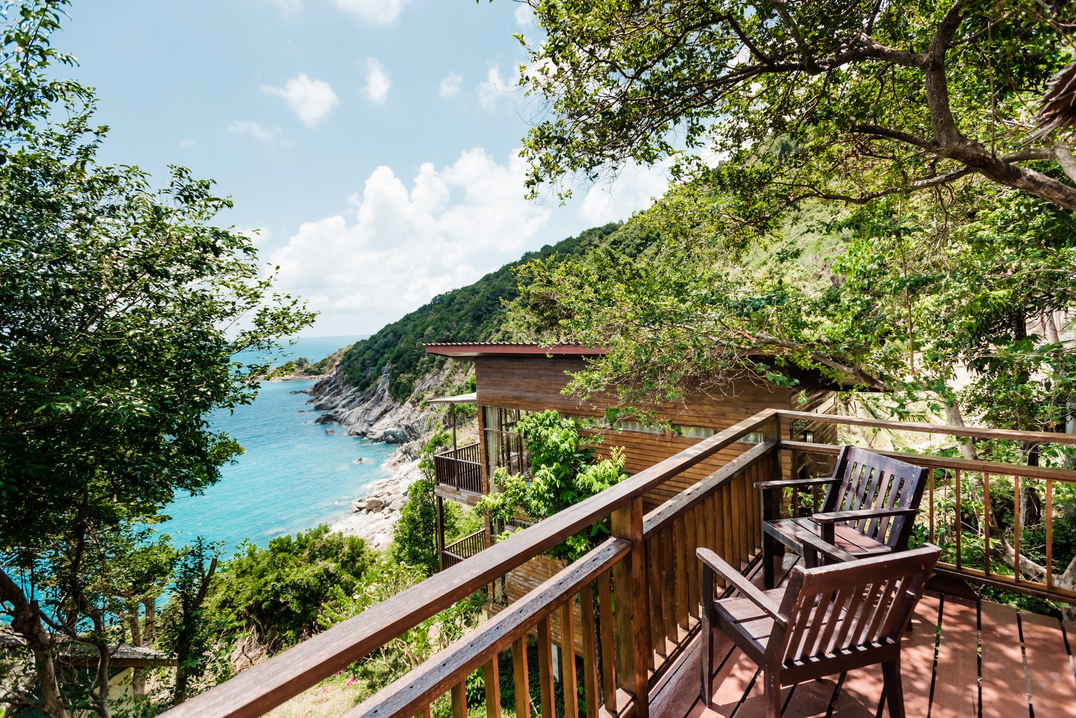 paradise house in the jungle with an ocean view wooden terrace blue sea and mountains