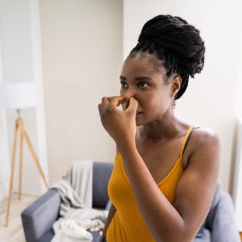 African Woman Feeling Bad Air Smell Or Odor