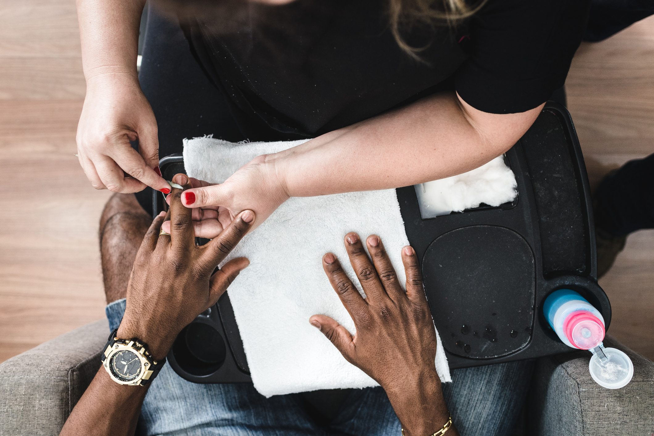 Man during manicure in spa