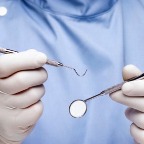 Dentist doing dental examination