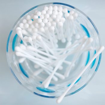 Cotton buds in a beaker