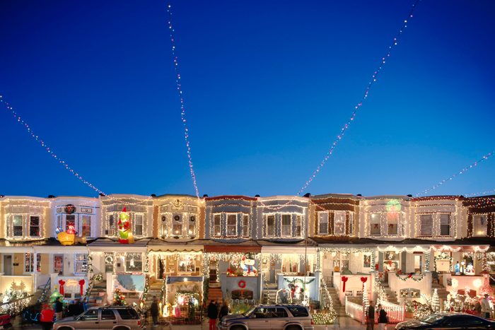 USA, Maryland, Baltimore, Hampden Community, 34th Street, Houses with Christmas decorations at dusk