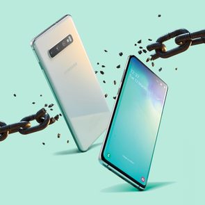 Two android phones breaking through a chain to represent rooting, or dismantling the phone's internal coding.