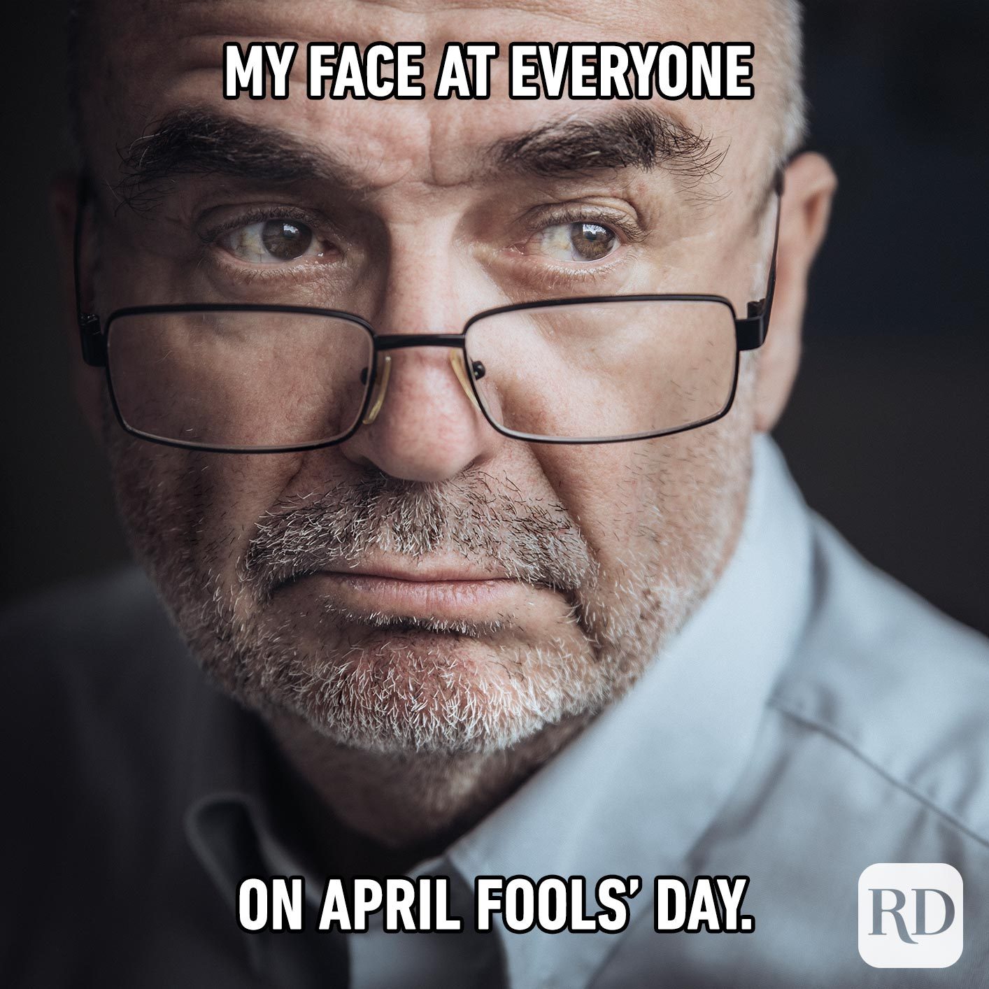 Man frowning and looking very serious. Meme text: My face at everyone on April Fools’ Day.