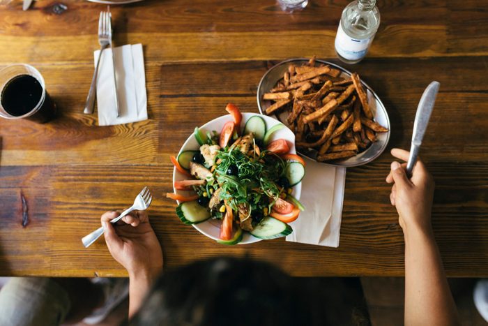 Aerial View Of Salad And Fries