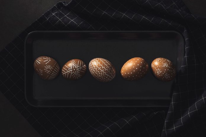 Hand painted easter eggs in a row