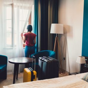 Tourist woman in luxury hotel