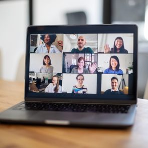 Colleagues having a work meeting through a video call