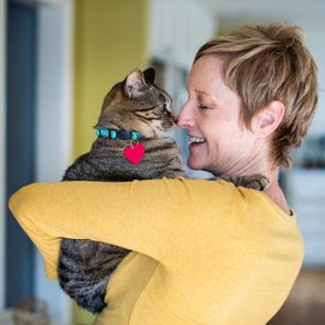 Woman Holding Her Cat