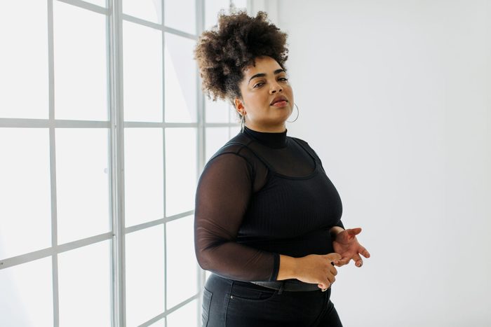 woman wearing black shirt and pants