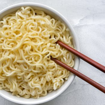 Noodles and Wooden Chopsticks. Top View