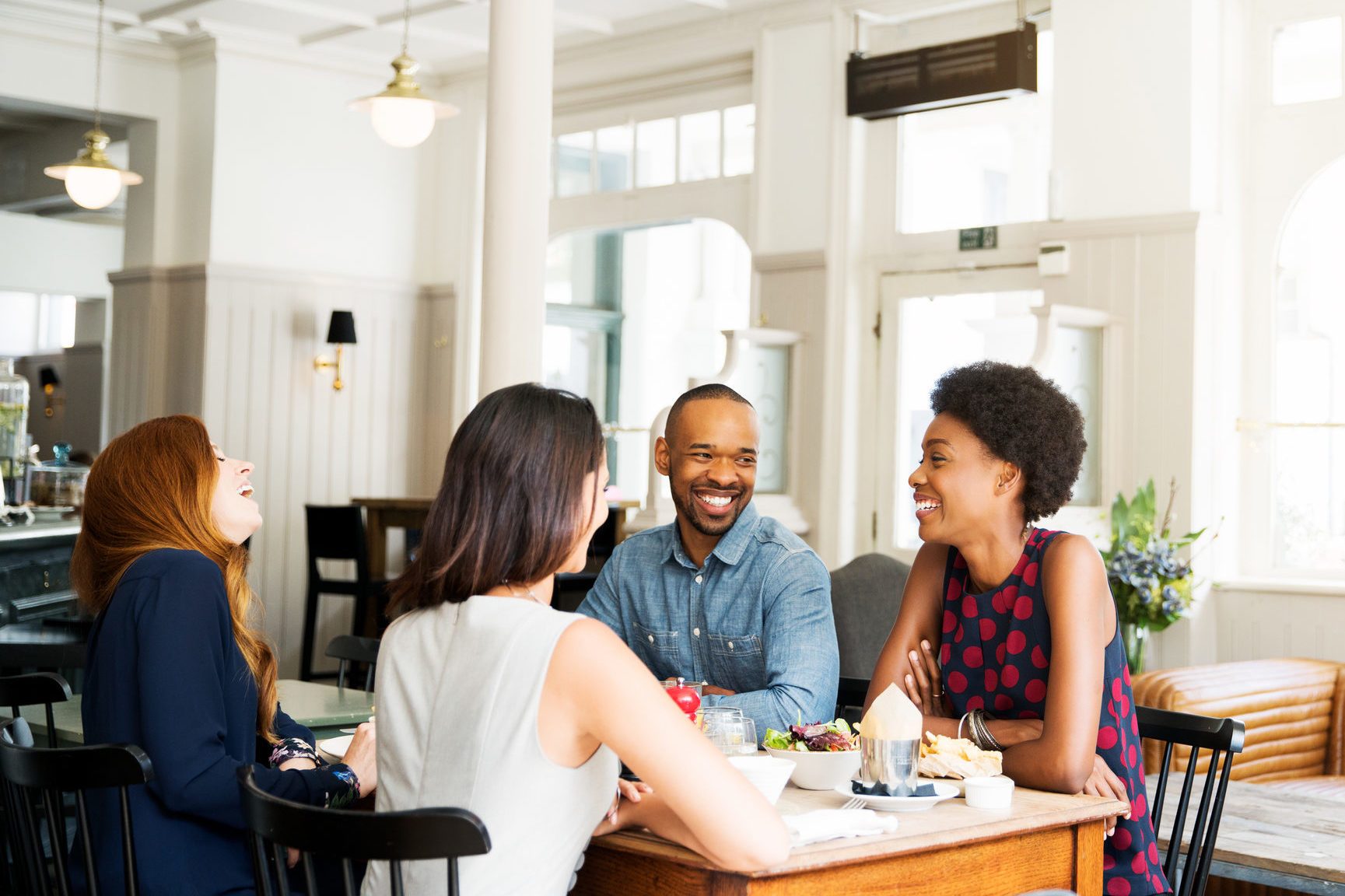 Four people having lunch