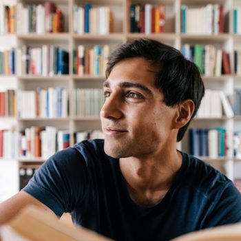 man reading and thinking