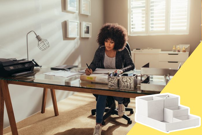 woman at desk with desk organizers