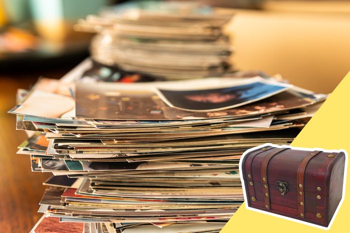 stack of photos with treasure chest