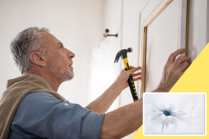 man hanging wall art