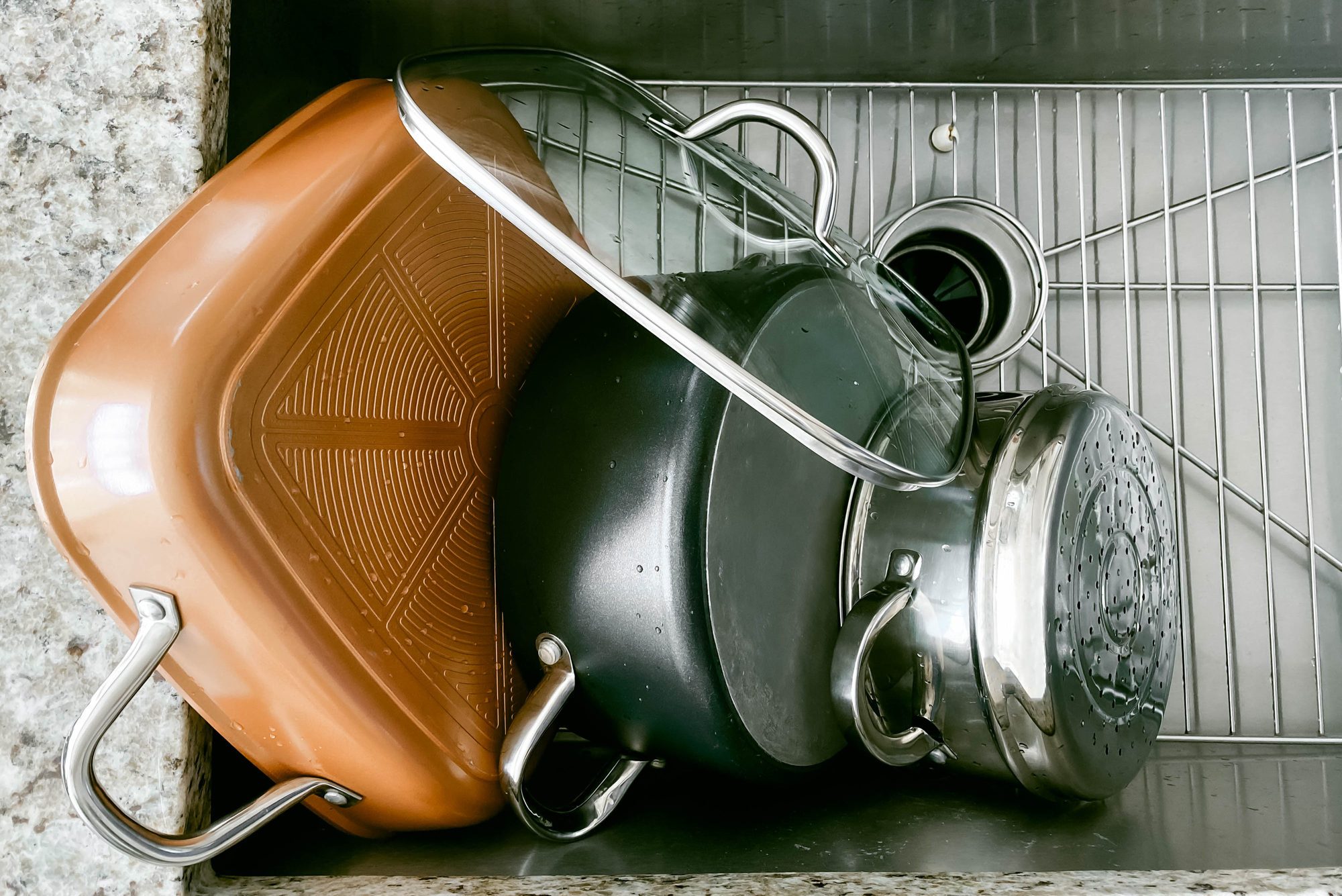 Pots Drying Off in Kitchen Sink