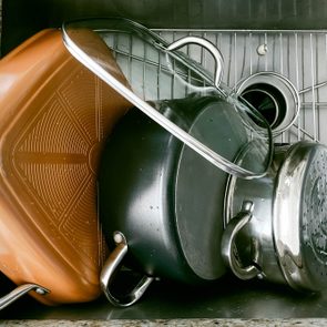 Pots Drying Off in Kitchen Sink