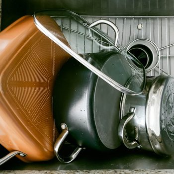 Pots Drying Off in Kitchen Sink