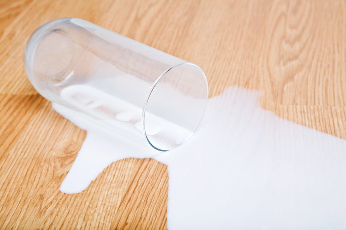 milk spilled from glass