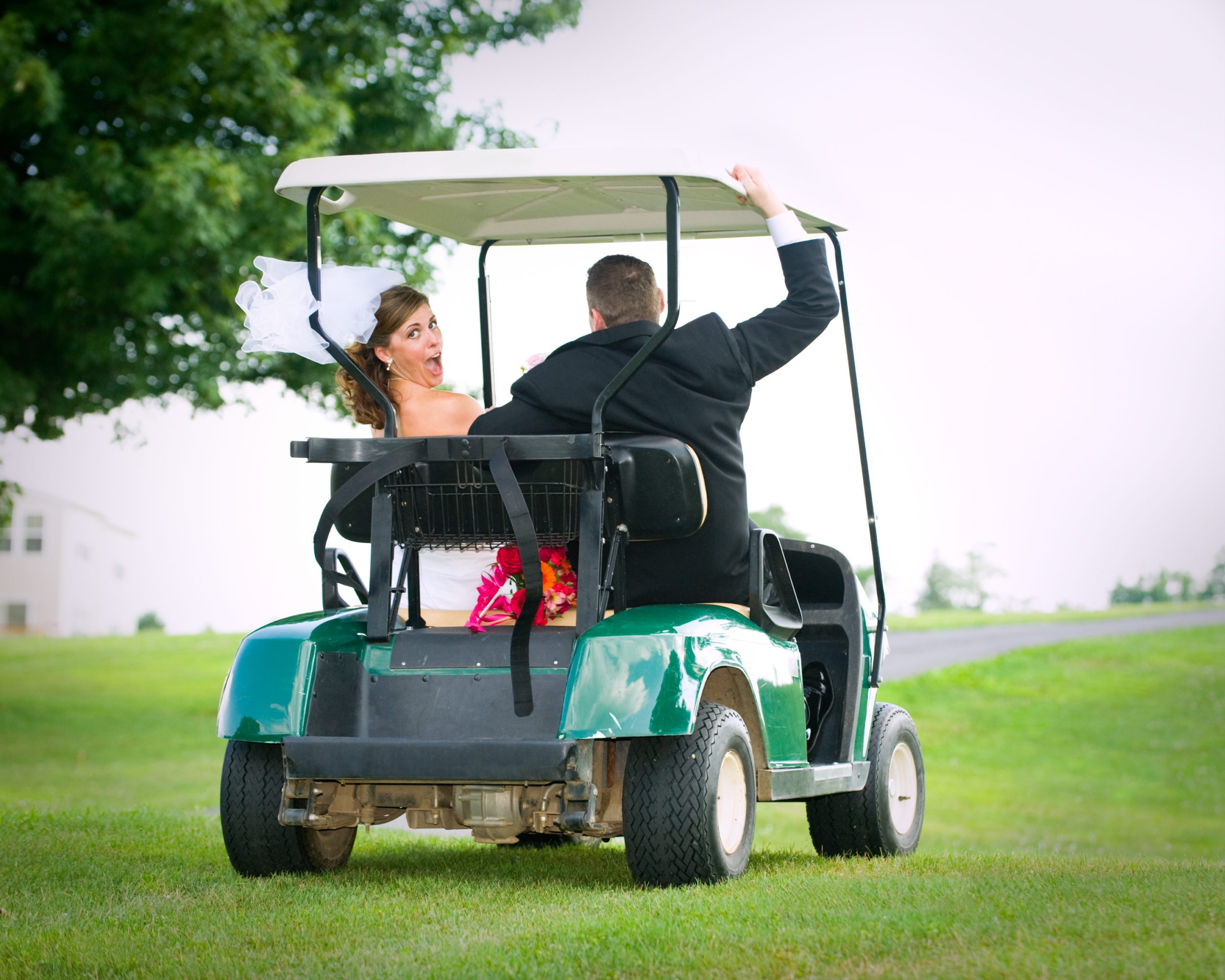 Runaway Bride and Groom in Golf Cart