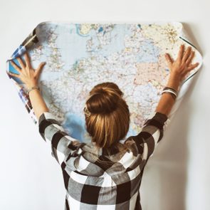 Young woman looking at map