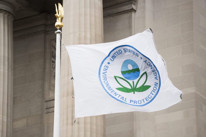 A flag with the EPA logo flies in front of the Environmental Protection Agency on Tuesday, Jan. 1, 2019.