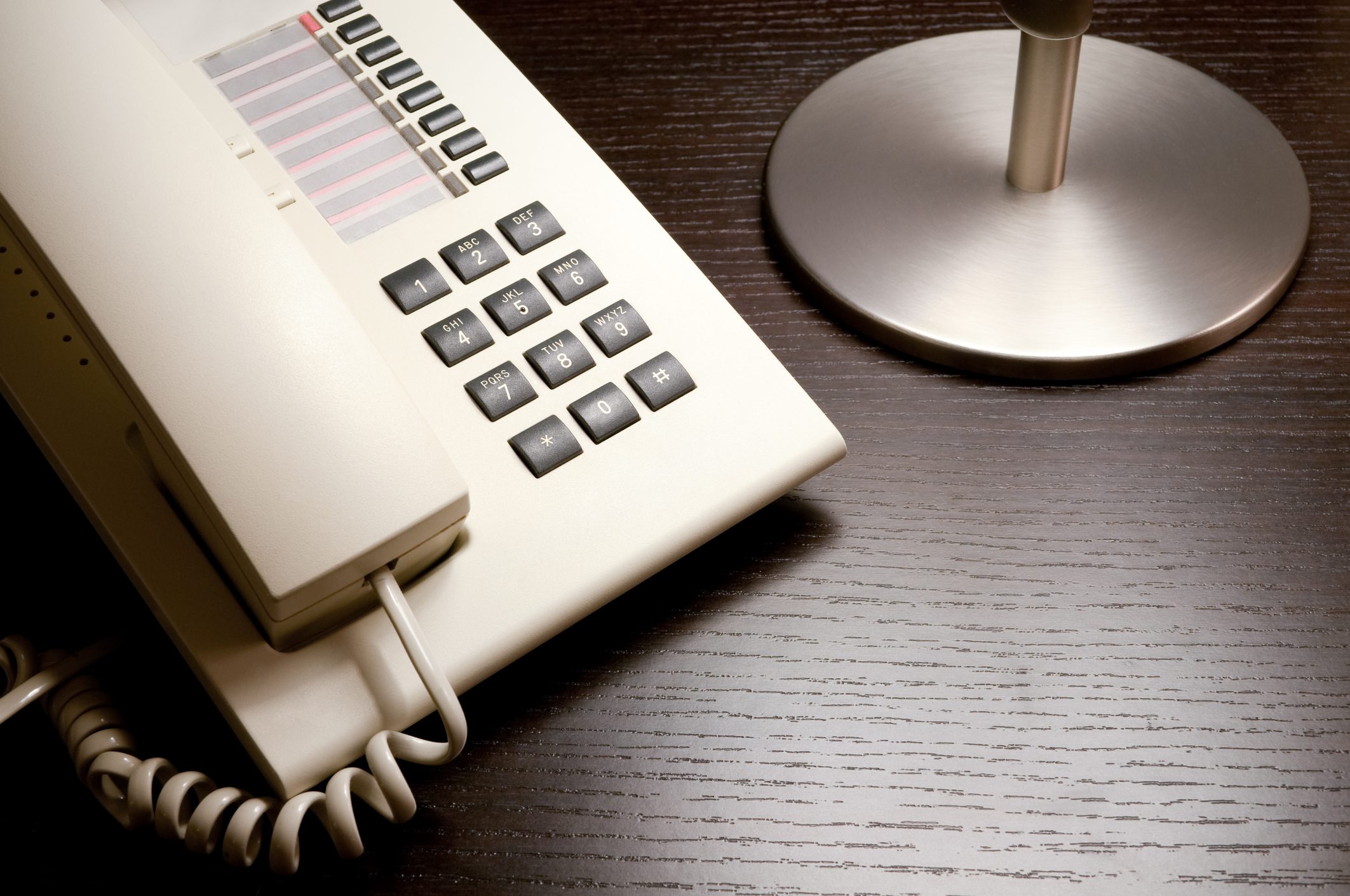 Hotel desk / night stand with telephone and copy space