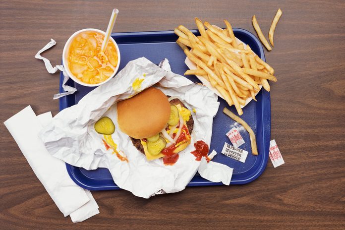 Elevated View of a Tray With Fries, a Hamburger and Lemonade