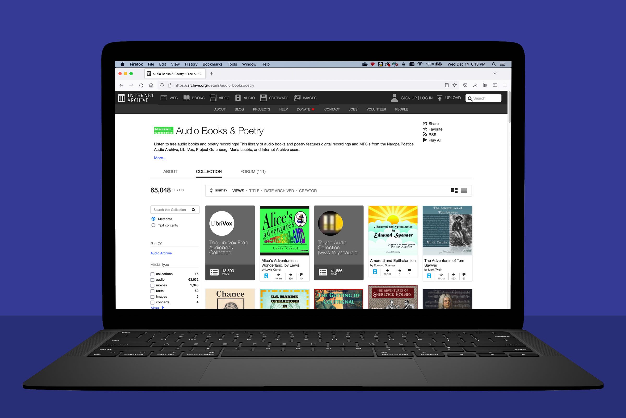 laptop showing archive.org; blue background