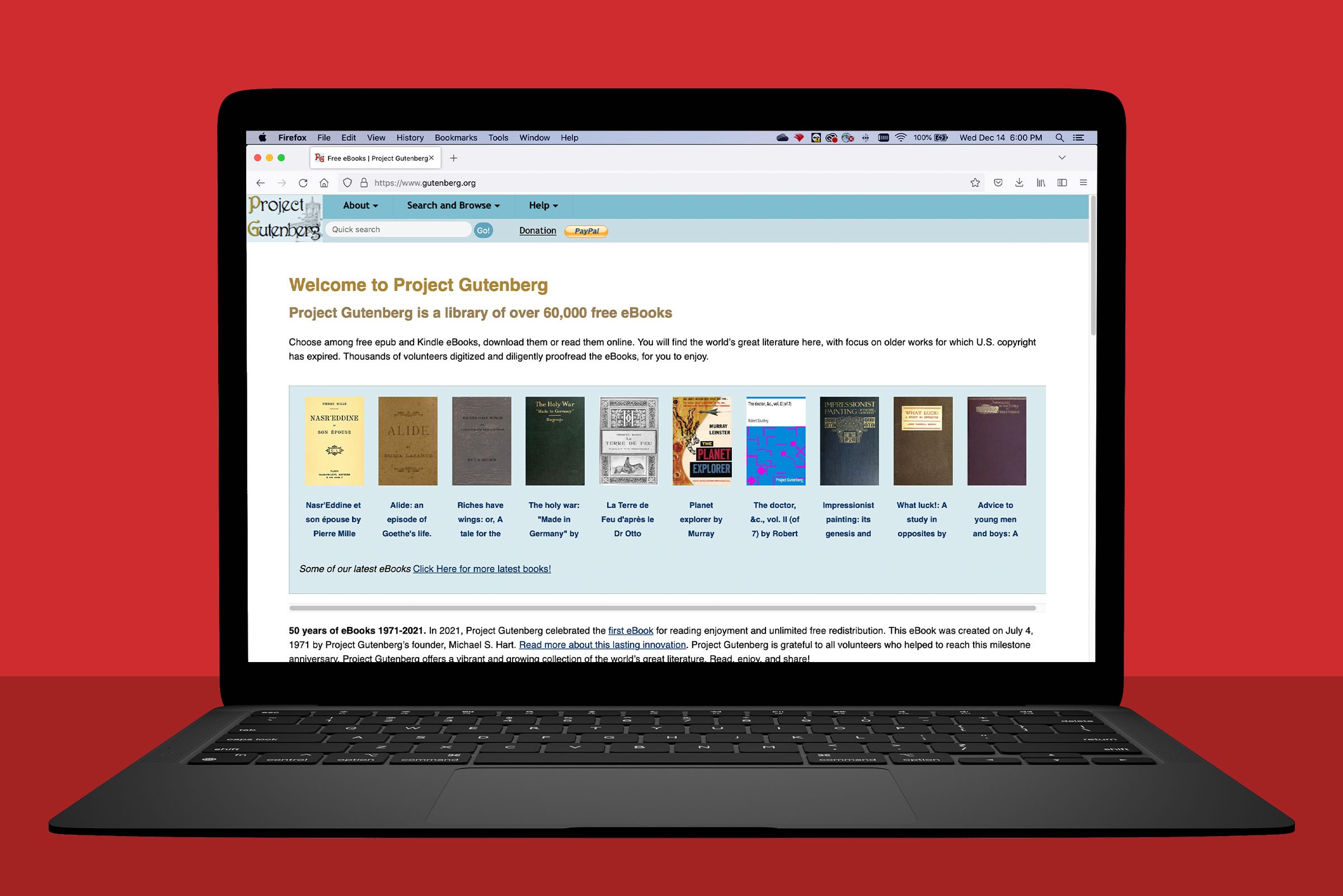 laptop showing gutenberg.org; red background