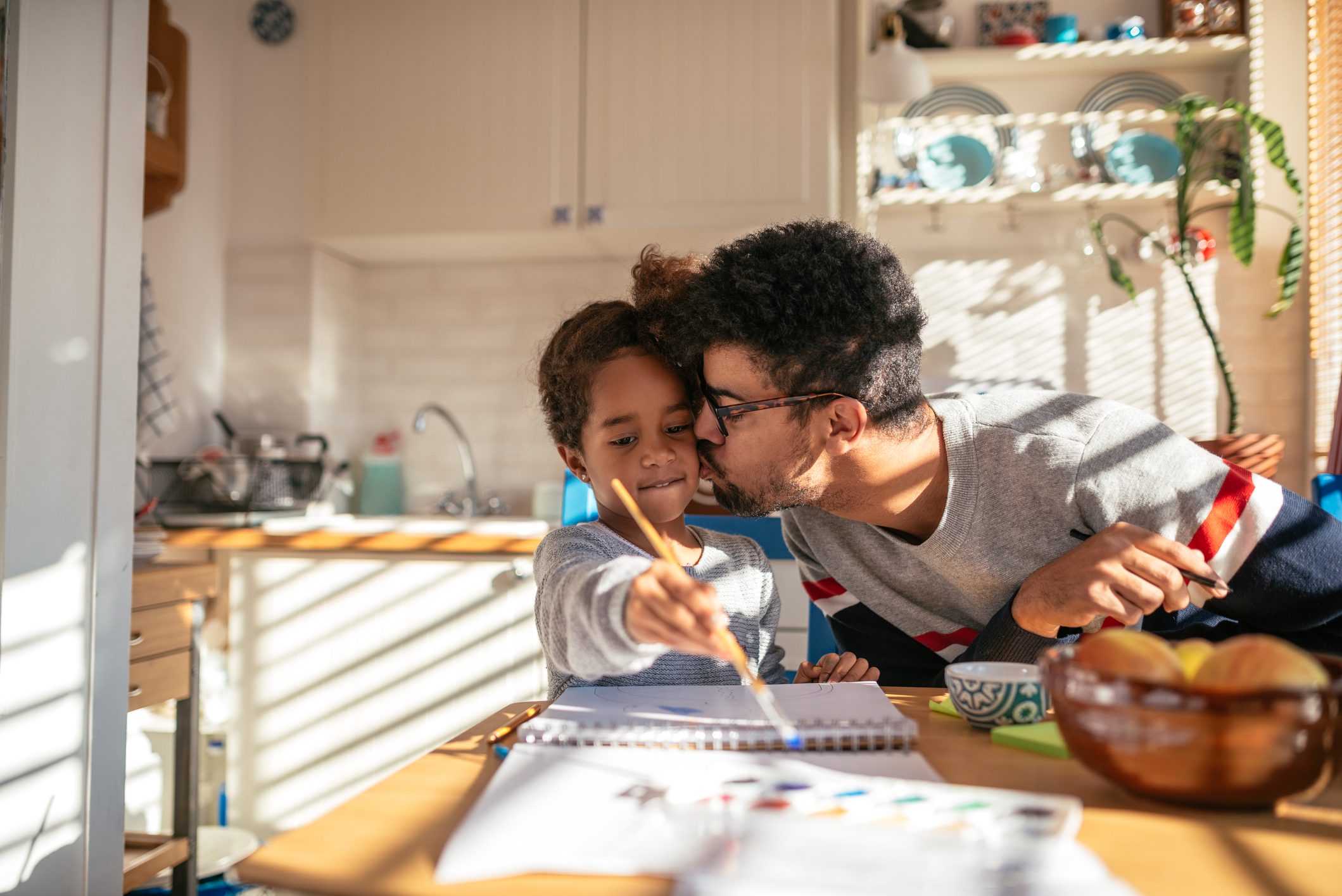 father and daughter doing crafts on fathers day