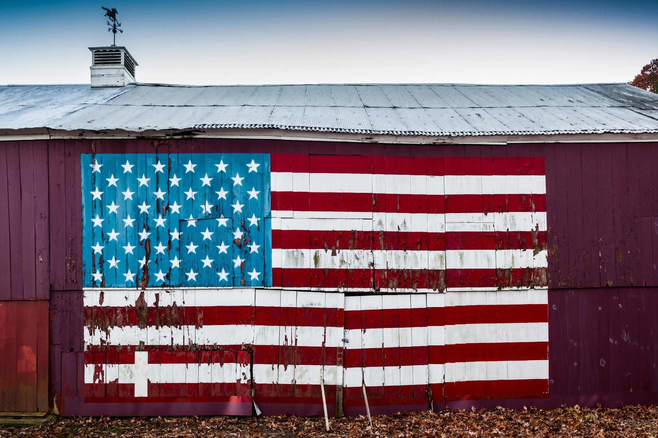 barn exterior with a large painted american flag in quinebaug, connecticut