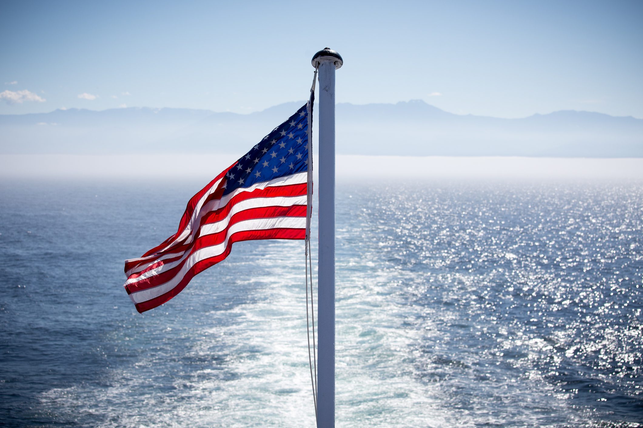 an American flag and sea, Port Angeles, Washington, USA