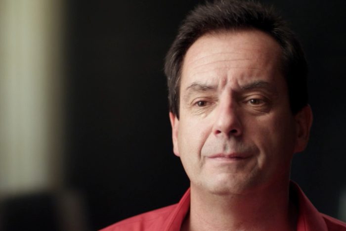 man getting interviewed