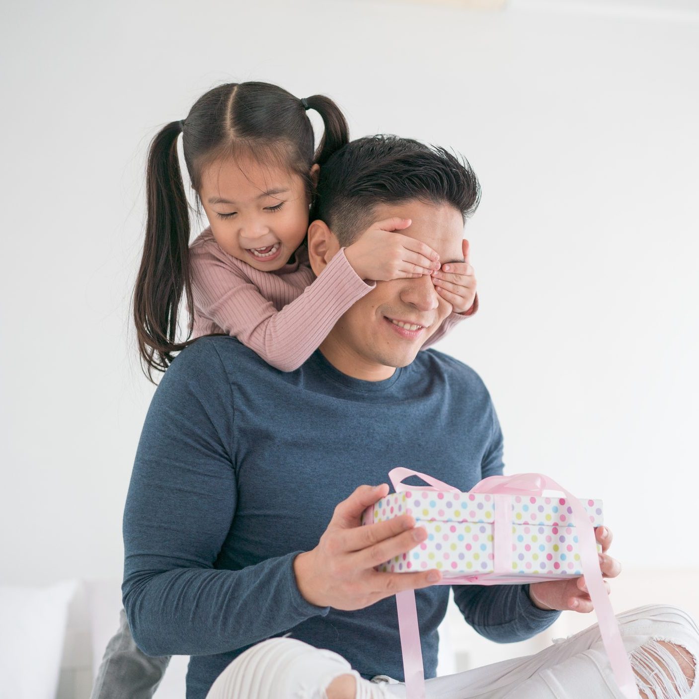 Daughter surprising father for father's day with a DIY gift