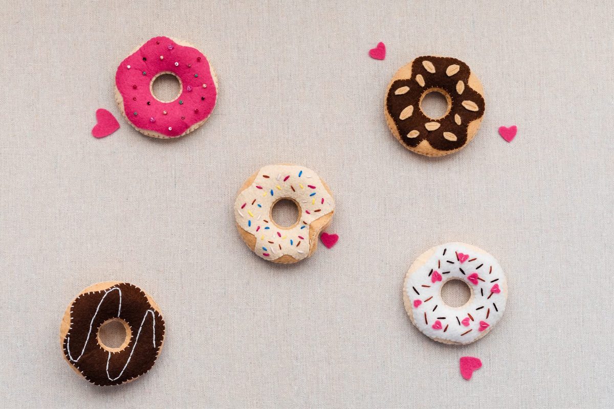 Flat Lay Of Handmade Felt Doughnuts With Colored Chocolate Are On A Beige Linen Background Concept Romantic Valentine S Day Gift Card Mothers Day Card Mothers Day Soft Sweets For Pretend Food