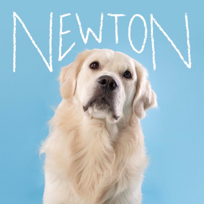 Boy dog name handwritten over a photo of a dog