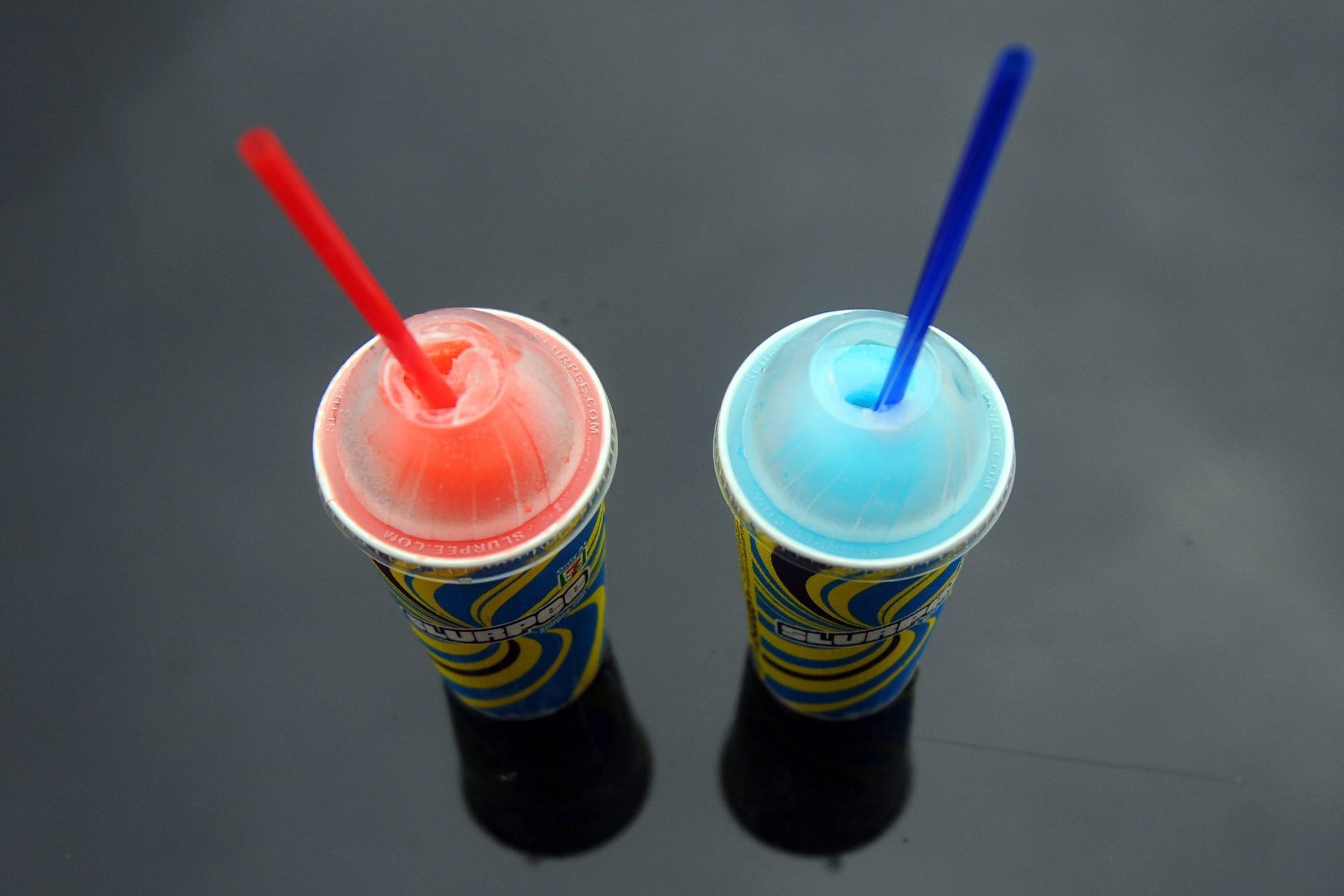 overhead photo of two slurpees on slurpee day at 7/11